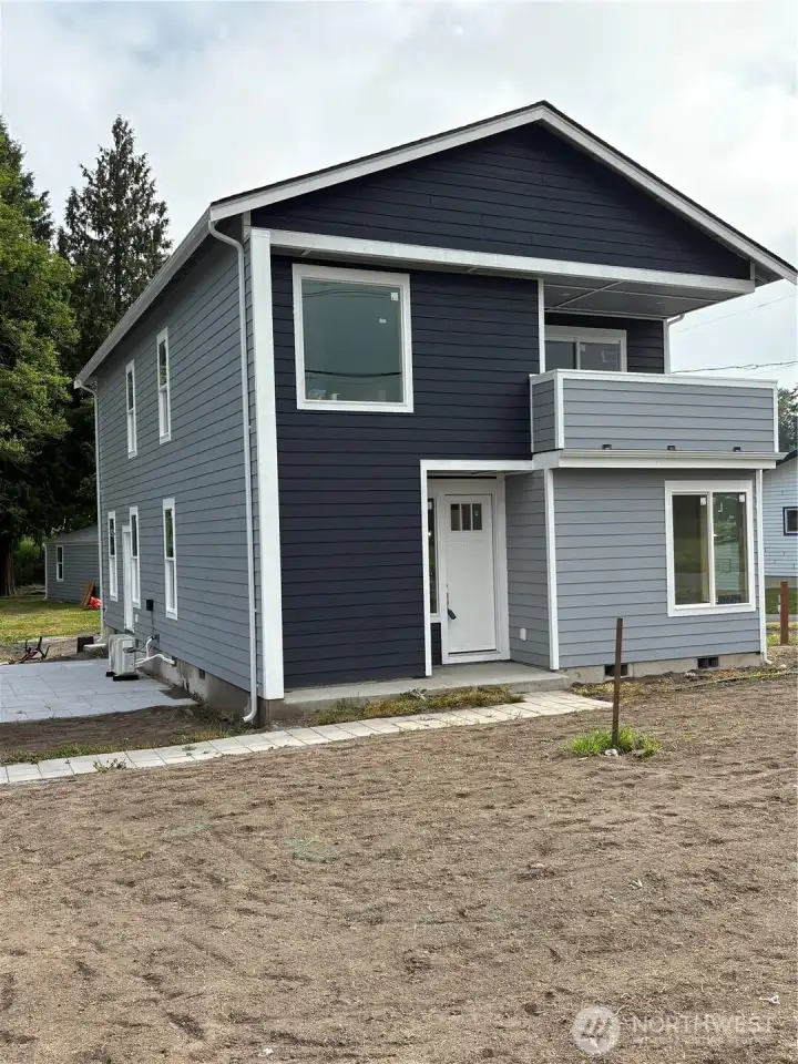 Front of the house with patio on the side