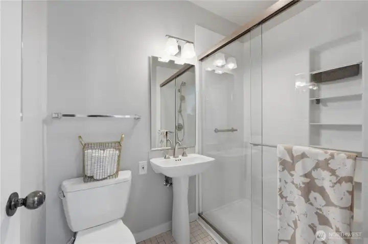 Wonderful guest bathroom with spacious walk-in shower. Wonderful guest bathroom with spacious walk-in shower.