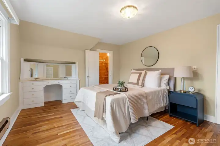 Primary bedroom with 2 walk in closets, built in vanity. Primary bedroom with 2 walk in closets, built in vanity.