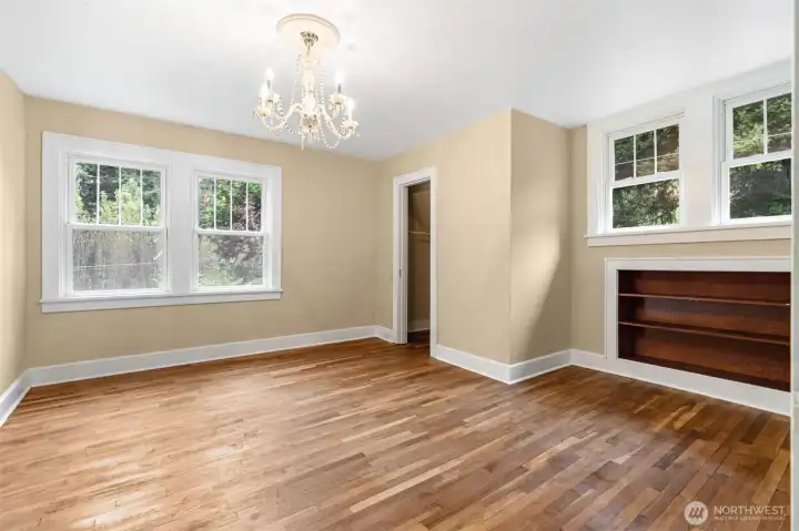 Bedroom #3, walk in closet, built in bookcase and a beautiful chandelier give this room a wonderful feel. Bedroom #3, walk in closet, built in bookcase and a beautiful chandelier give this room a wonderful feel.