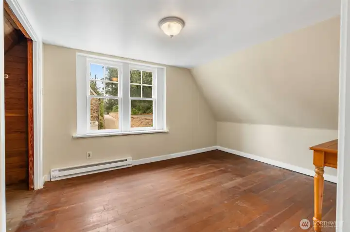 Cottage bedroom with large closet and built-in cabinets. Cottage bedroom with large closet and built-in cabinets.