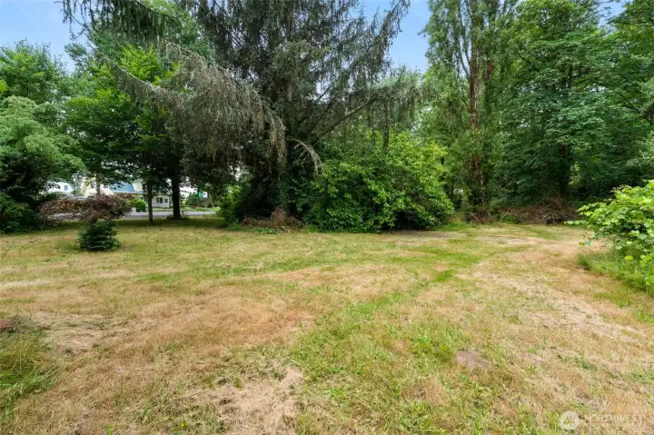 Room to spread out on level acreage leading to swimming hole and shop. Room to spread out on level acreage leading to swimming hole and shop.