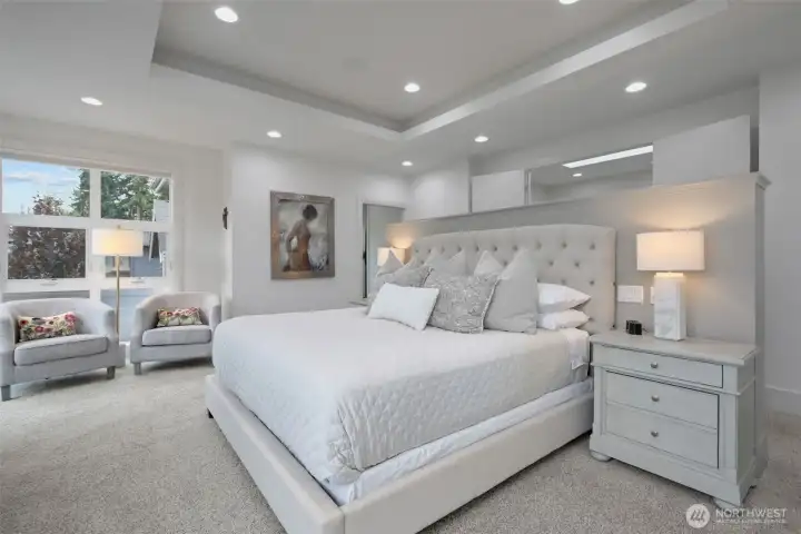 Primary with room for gorgeous dressers and night stands.