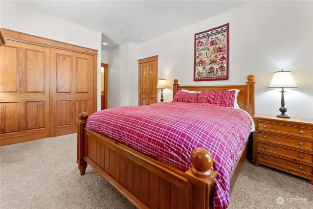 Primary bedroom on main level of the cabin. Has ensuite bath. Large closet. Carpeted.