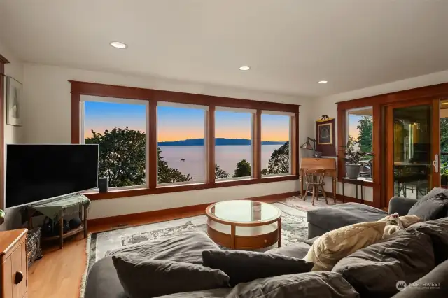 A wall of windows brings in the incredible views of the Sound.