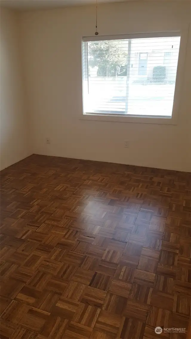 Parquet floor in bedroom in Unit B