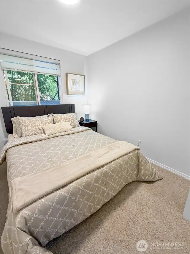 The bedroom has a bump-out on one side.