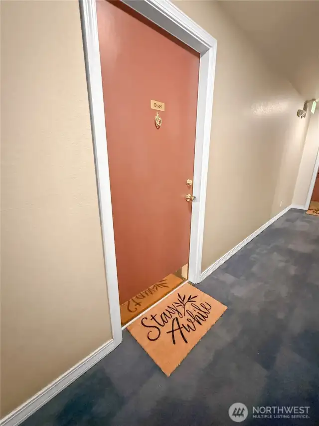 7. Your new home is conveniently located on the first floor, near the lobby. Whether you enter Building B through the front door or come up on the elevator from the secure parking garage, B-105 is just a few steps away.