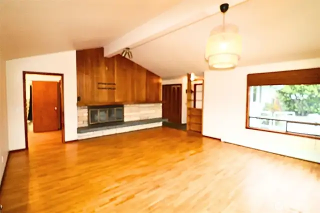 Large Living Room with a fireplace - real wood floors!