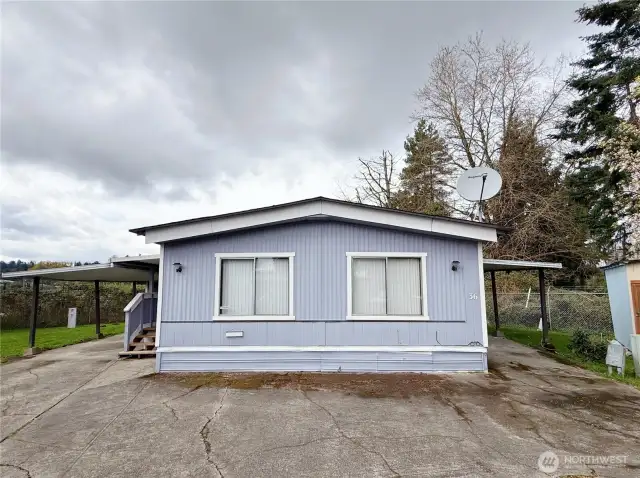 Unit 36, Tucked Away in the back of the neighborhood in a quiet cul-de-sac, with covered parking spaces on both sides