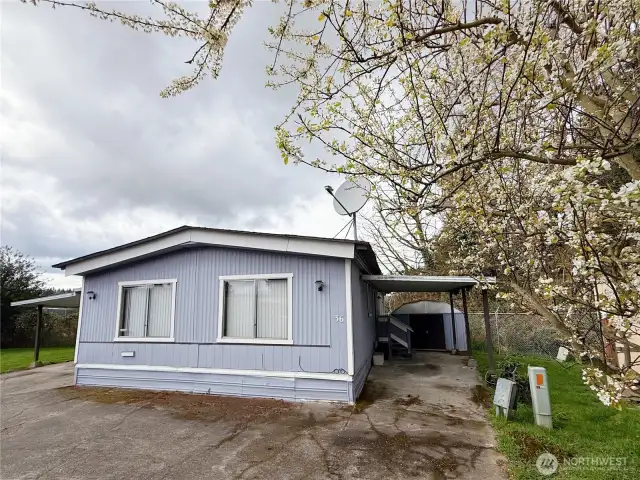 Unit 36, Tucked Away in the back of the neighborhood in a quiet cul-de-sac, with covered parking spaces on both sides