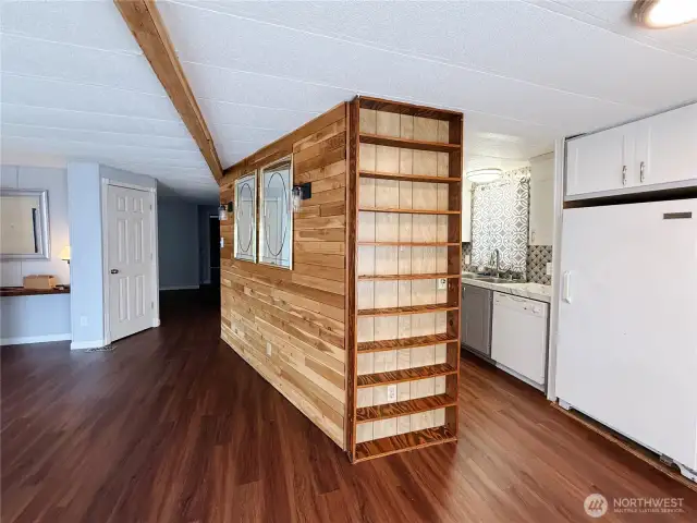 Living Room off of kitchen and entry with heat producing electric fireplace