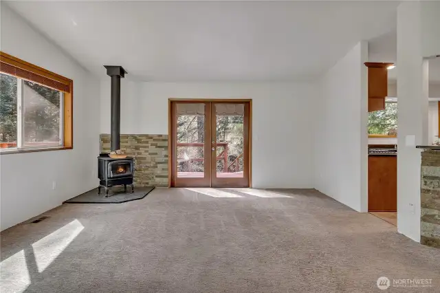 Great Room to Wood Stove and Fr Doors