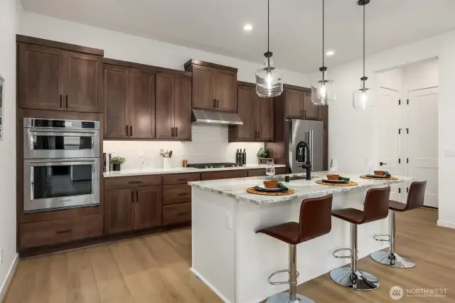 Ample storage with kitchen cabinets and breakfast bar kitchen island