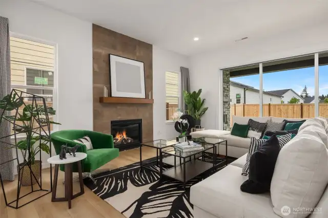 Great room with floor to ceiling tile surround and gas fireplace