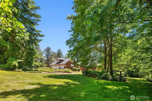 Level sprawling lawns offer total privacy and room to roam