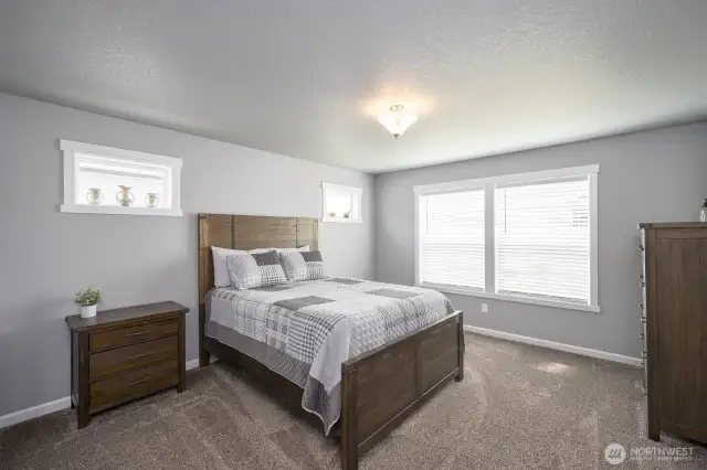 Cozy primary bedroom suite.
