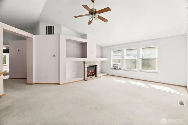 Spacious great room with natural light and fgas fireplace.
