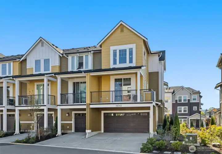 Welcome to Unit 106! This side of the townhouse provides direct access to the garage