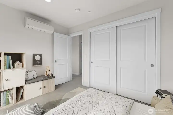 Another bedroom on the upper third level (virtually staged)