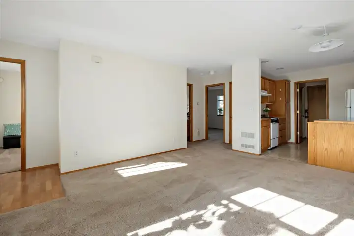 Main Living Area - Kitchen + Hallway to Primary.