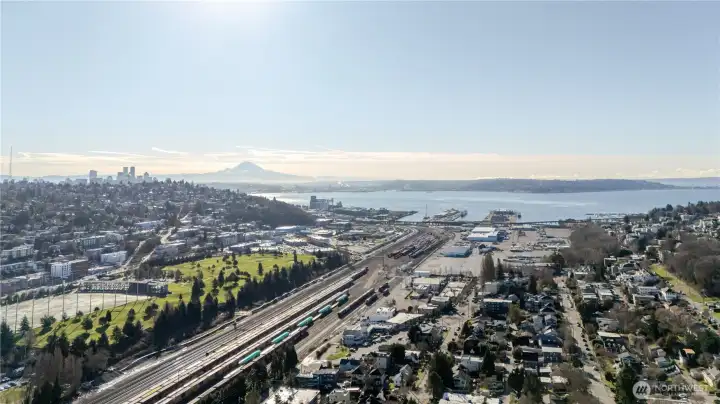 Views of downtown Seattle, Mt. Rainier, and Magnolia Park (right).