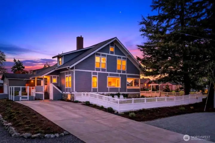 Dramatic sunsets from this charming home located in Anacortes' Historic District.