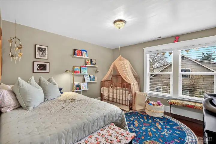 View of third bedroom upstairs is large and bright.