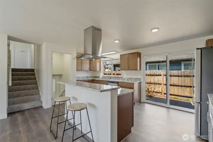 Spacious island bar for food and conversation.