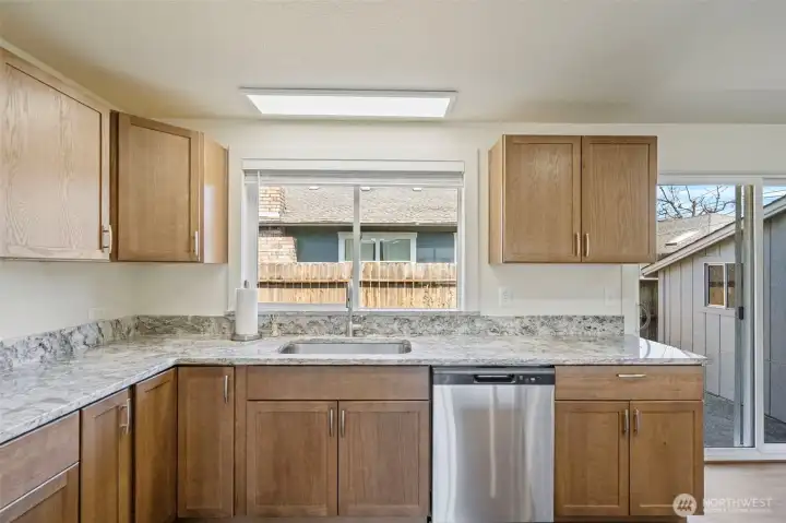 Countertop space for days. Sink has disposal.