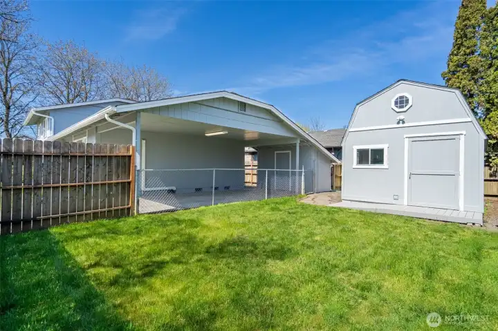 Fenced play area or pet area.