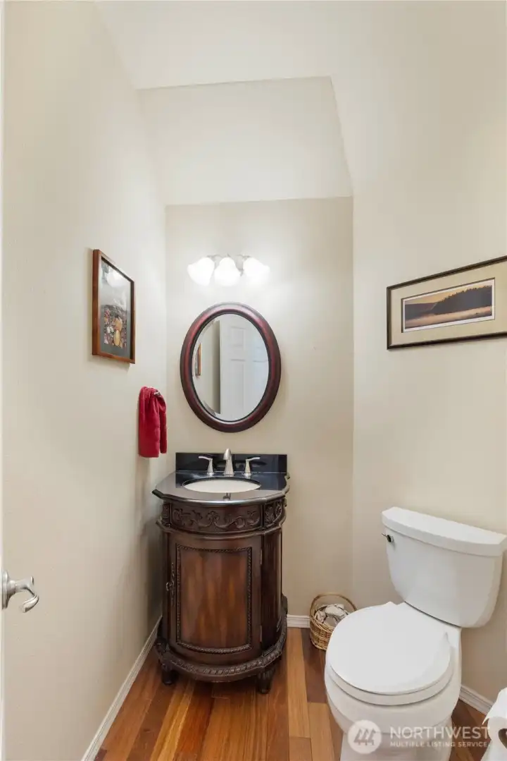 and 1/2 Bath off entrance with Hardwoods, Beautiful Sink/Cabinet