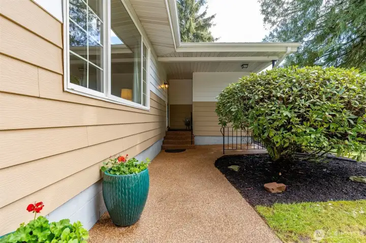Sealed and freshly coated front entry walkway and stairs.