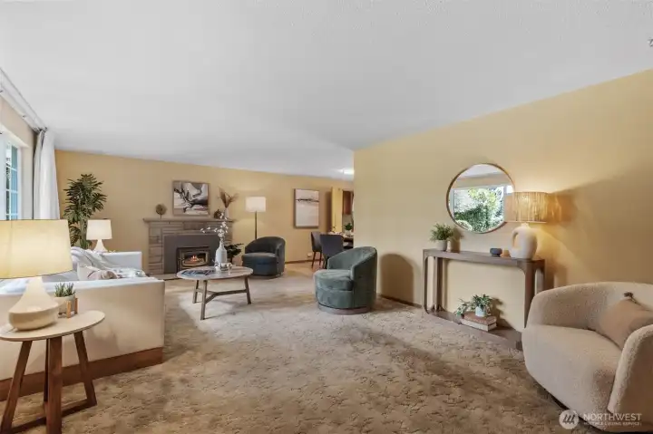 Large and open living room with cozy wood burning fireplace. Holiday gatherings are the best here!