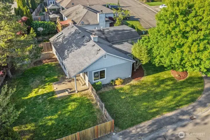 Fully fenced, level corner lot with excellent curb appeal.