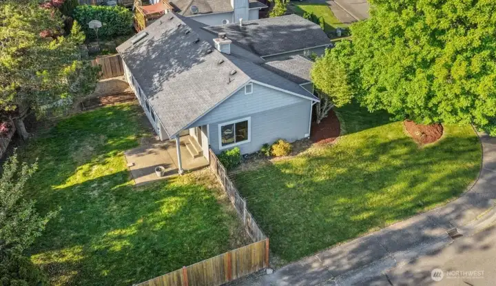 Fully fenced, level corner lot.
