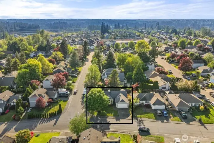Stunning aerial views showcase the spacious corner lot and surrounding neighborhood.