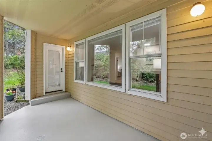 Outdoor covered patio (looking at Primary bedroom door)