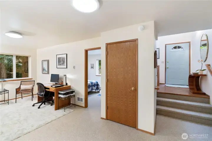 Looking at the office area, second bedroom and the entrance landing.