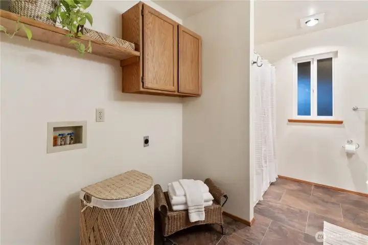 Laundry area in the downstairs bathroom.