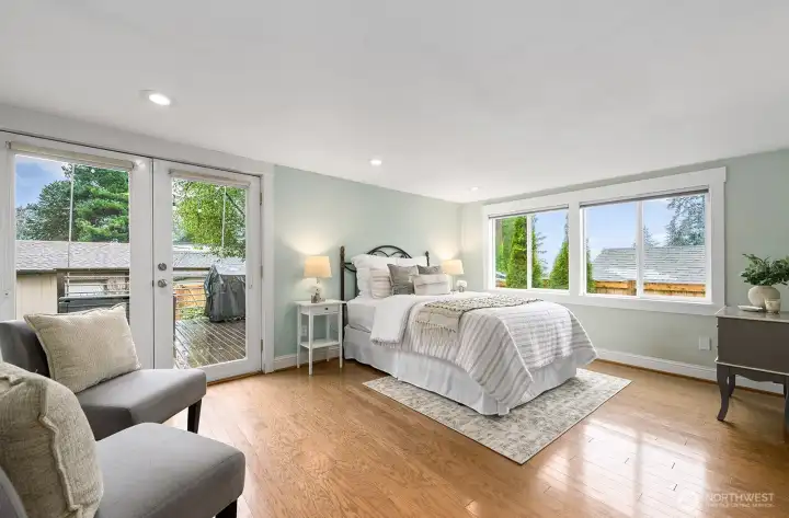 Large primary with french doors to deck Large primary with french doors to deck