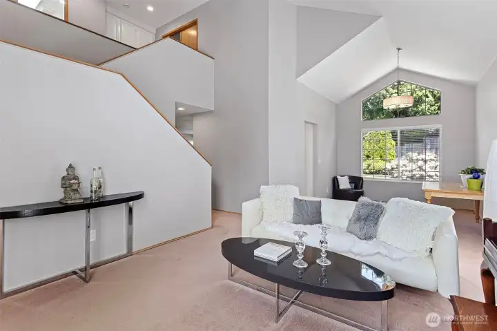 Lovely lines in this soaring two story area.