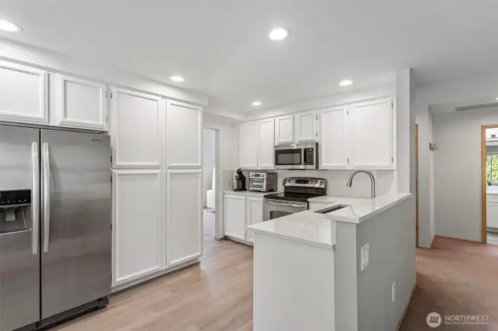 Efficient kitchen design.  upgraded countertops.