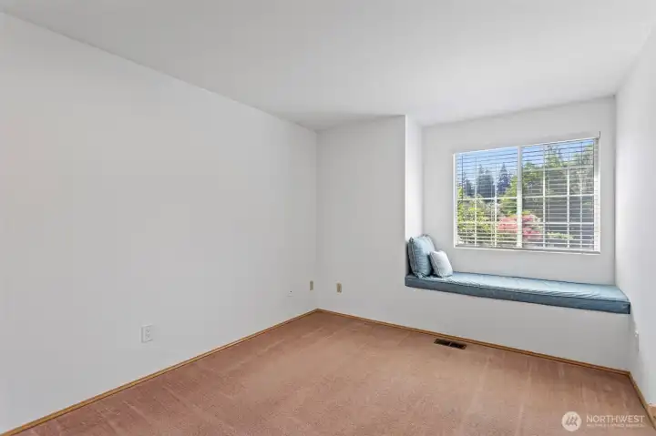 Another good sized 3rd bedroom with window seat