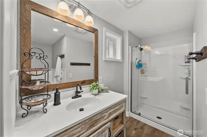 Updated primary ensuite with bluetooth enabled exhaust fan for a spa-inspired touch. Updated primary ensuite with bluetooth enabled exhaust fan for a spa-inspired touch.