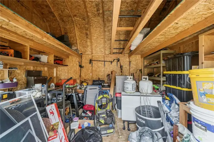 Storage shed offers ample room for tools, equipment, hobbies, or additional storage. Storage shed offers ample room for tools, equipment, hobbies, or additional storage.