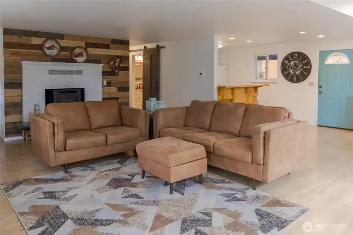 Ohhh and there is a lovely fireplace to create ambiance or snuggle up to on those chilly PNW nights Ohhh and there is a lovely fireplace to create ambiance or snuggle up to on those chilly PNW nights