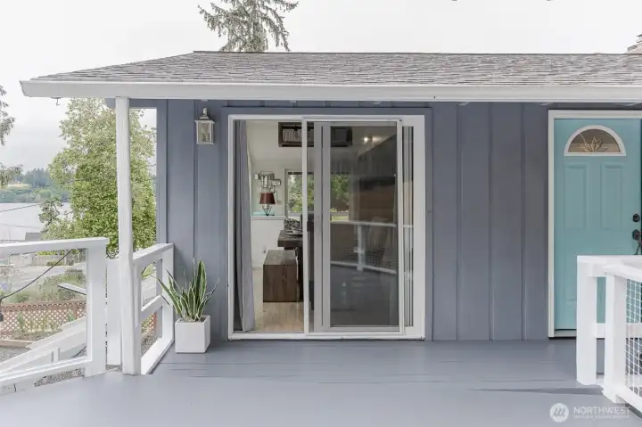 Sliding door and main door opening onto the deck Sliding door and main door opening onto the deck