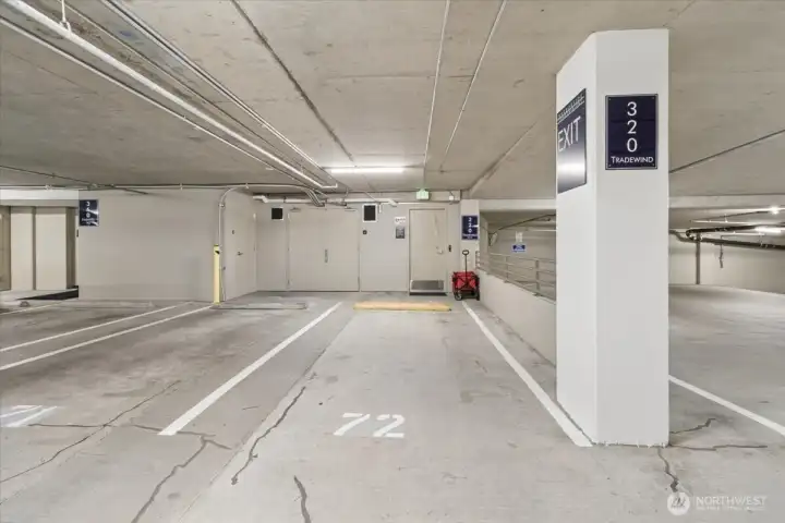 Best parking spot in the whole building. Right in front of the entrance door. ZERO steps between parking and your condo. Red wagon conveys with sale! What a deal!