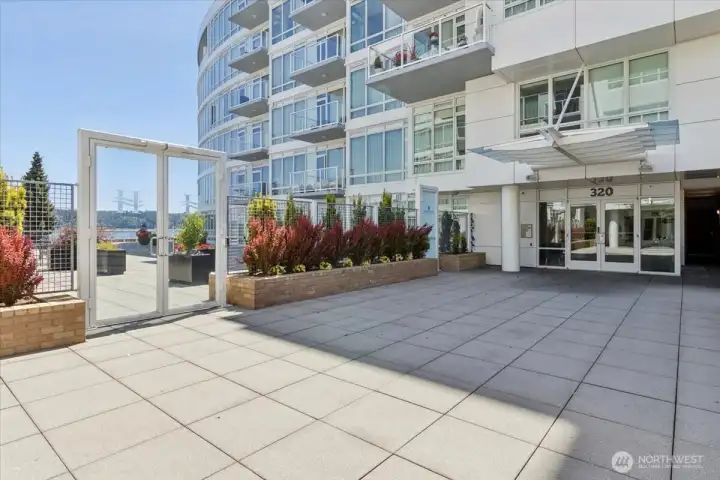 Front entrance of building and common space patio.